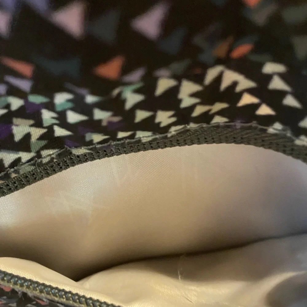 Stylish Blue and Black Geometric Backpack with Reflective Finish